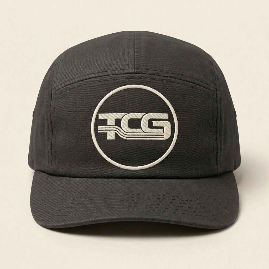 TCG five-panel cap concept with direct logo embroidery, no patch
